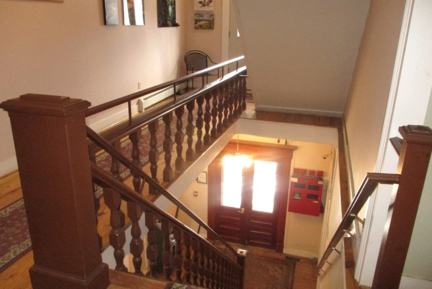 stairway to east front door