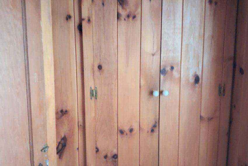 hall closet with clothes rail